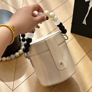 classic black white bead handle bags Luxurys Designers cowhide bags Presbyopic handbags purses cannes modeling crossbody bucket evening bag 240315