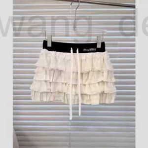 Skirts designer KK contrasting elastic waistband embellishment layered cake skirt black and white effect embroidered letters with distinctive features AY1M
