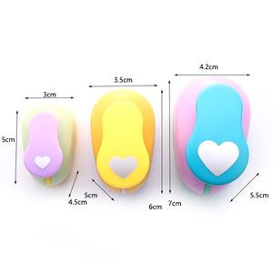 1pc Plastics Heart Hole Punch Diy Diy Devicing Device Детское образовательное измельчение машины ручное управление бумажными школьными принадлежностями