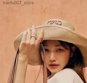 Wide Brim Hats Bucket Hats 2023 Summer New Jacquard Embroidered Fisherman Hat Pieced Leather Woven Beach Sunshade Straw HatQ240403