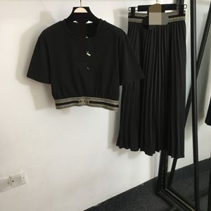 401 2024 Новые продукты Летнее высококачественное платье взлетно -посадочной полосы Черная флора печатная панель экипаж черная длинная юбка