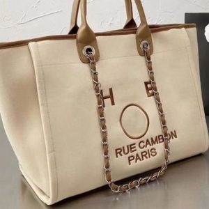 Bolsas de praia femininas de luxo Bolsas de tela ch Packs bordados para mulheres clássicas Bolsa de alta qualidade Handbag303y