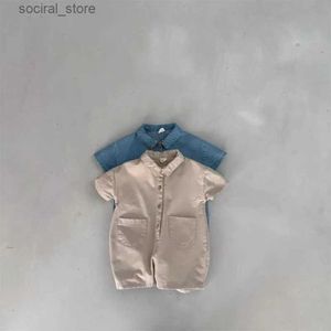 Rompers 2023 sommar ny baby kort ärm lapel ficka romper nyfödd spädbarn casual denim jumpsuit för pojkflicka småbarn jeans kläder l240402