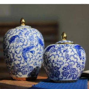 Garrafas de armazenamento Jarro redondo de porcelana azul e branco com tampas de potes de cerâmica recipientes cosméticos vaso floral decorativo de flor artificial