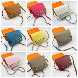 fashion luxury silver buckle decorative flip opening and closing retro Joker calf leather pig nose bags shoulder messenger bags mini ladies saddle red.