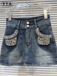 Vestidos sexy urbanos Mulheres primavera no verão Moda de jeans de jeans alta diamantes de diamantes de rua vintage Saias de carga de rua high