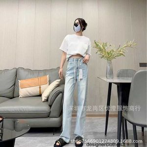 Designer Nanyou Women's 24 Early Spring New Fashion Jeans tvättade högt midja Löst kött som täcker dragsko mångsidiga byxor uy0s