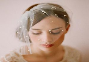 2015 Cheap Birdcage Wedding Veils 1 LAYER Ivory Blusher Short Bridal Wedding Veils With Beads9431701