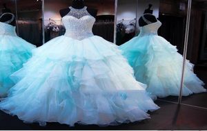 Princess Ocean Blue Ball Gown Quinceanera Dress 2020 Sweet 16 Dresses Pärlade paljetter Sheer Neck Debutante -klänningar plus storlek Vestidos2276947