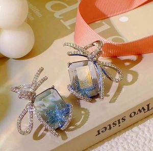 Earrings Ice blue first snow bow earrings for women ins design shiny zircon ribbon sweet romance winter romance ribbon ears jewelry