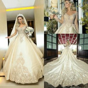 Kleider luxuriöser Kathedrale Zug Brautkleider mit Illusion Langarm Sticked Perlen Sheer Jewel Champagner Hochzeitskleider Brautkleider Brautkleider