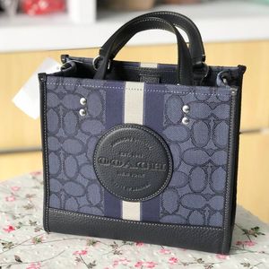 10A TOTE TOTE DEMPSEY Designer Torby dla damskiej męskie sprzęgło Cross Body torebki torebka 2Size luksusowa torba na ramię sacoche Pochette Bagaż na pieluchy różowe torby