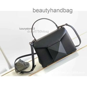 Bolsa de Bolsa de Valentine Designer 2023 Bolsa de mão Rivet Lady Square Oblíquo Cruz Magnético Couro grande Menina Mulher Moda Bolsa de Moda