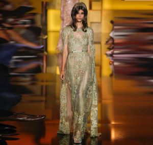 Abiti Elie Saab 2016 Abiti da ballo d'oro Sheer See attraverso abiti da sera scintillanti con appuntamenti con mantello da pista da festa formale su misura