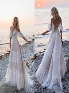 Bohemian Beach Lace A Line Wedding Dresses Spaghetti Cinghie Tulle Applique Sweep Train Boho abiti da sposa abiti da sposa Robe De Mar6879632