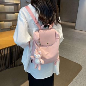 2024 Französische Trendy Brand Rucksack Frauen 2023 Neue Trendy Mode Gewichtsreduzierung Tragbare Studentenbeutel große Kapazitäts -Reise -Rucksack10a