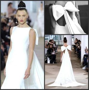 ファッションホワイトの特別なバックデザインビッグボウイブニングドレスマーメイドステインノースリーブプロムドレス長いレッドカーペットドレス6415315
