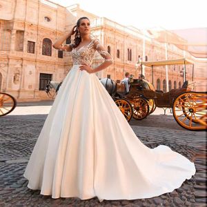 Dresses Amazing Tulle & Satin Bateau Neckline Seethrough ALine Wedding Dresses With Beaded Lace Appliques See Through Long Sleeves Brida