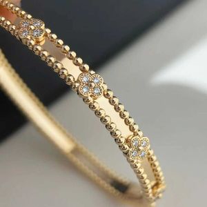 Vans Fashion Clover Narrow Edition Kaleidoscope Bracelet Thick Plated 18K Gold Diamond Clover Bracelet Exquisite Handpiece as a Gift for Girlfriend