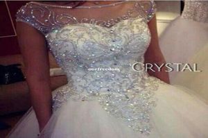 Vestidos de bola vestidos de noiva novos lindos lindos princesos de princesa noiva real imagem de tule luxuosa strass artesanal cristal sheer top3342519