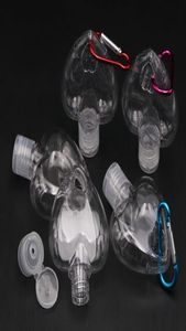 Garrafa de desinfetante para a mão do formato do coração de 50 ml com chave de chave de anel de chave transparente transparente recipiente recarregável garrafa de viagem Patry Favo6889042