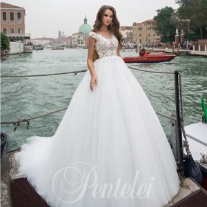 Sukienki Niesamowite suknie ślubne suknia balowa rękaw czapki z aplikacjami z koraliki tiulowe suknie tiulowe sukienki ślubne vestido de noiva