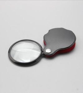 Mini Glass Lens Pocket Magnifier med läderpåse Folding Förstoring Glasögon Tool Lupas de Aumento Microscope Ferramentas1847269