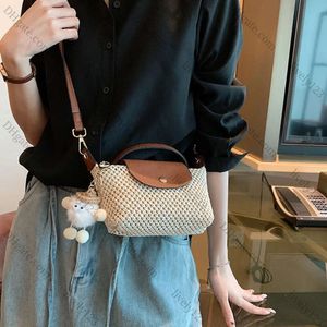 2024 Mini Sticked Dumplings Womens Bag 2024 Ins One Shoulder Crossbody Bag Beach Vacation Designer Väskor Lyxiga plånböcker och handväskor 10A