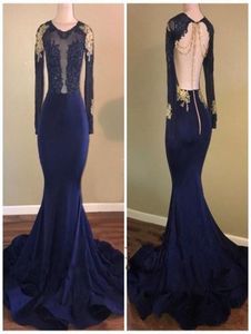 2020 African Navy Blue Mermaid Prom Dresses Sheer Jewel Neck Backless Long Sleeves Beaded Gold Lace Applsique See Though Evening G3126493