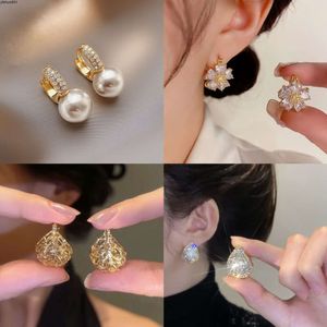 Kolczyki Xiaoxiangfeng do kobiet Summer Nowe modne Pearl Pure Silver Ear Studs Elegancki styl i z wysokim poziomem wyrafinowania