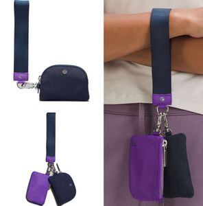 luxurys dual pouch wristlet clutch bag lu women man Designer keychain handbag Cardholder coin purses nylon wallet key storage holders2024