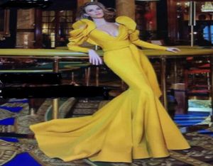 2017 Yellow Mermaid Promowe sukienki z falbanymi puszystymi długimi rękawami i zanurzającym V Szyjki Szyjki Pociąg Evening Solens1451323