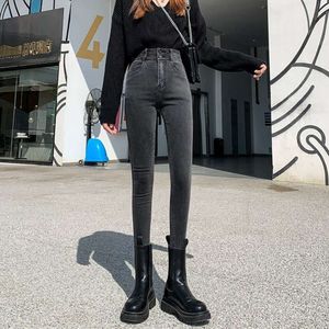 Kadınlar için yüksek bel ve küçük bacak kot pantolon 2024 İlkbahar ve sonbahar mevsimi yeni ince uyum ve zayıflama elastik bel sıkılaştırma ve kalça kaldırma kalem pantolonu
