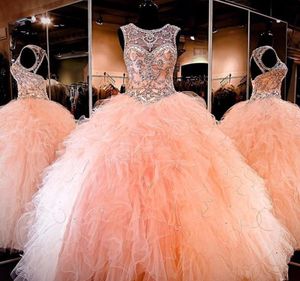 Suknia balowa 2019 Długość podłogi Niesamowite kryształy rhinestone Blush Peach Quinceanera Sukienki