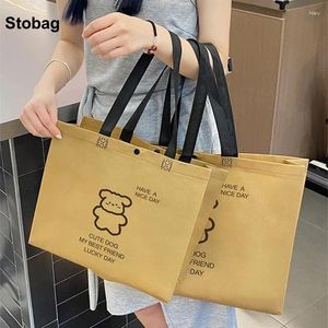 ストレージバッグStobag 10pcs不織布トートショルダーショッピングエコファブリック女性再利用可能なポータブルポーチカスタムロゴ（追加料金）