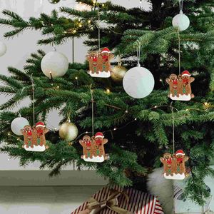 Dekorative Figuren 12 PCs Weihnachten Lebkuchen Haus Dekorationen Urlaub Partybaum Hänge ornamente Mann für Weihnachten PVC Mini -Anhänger