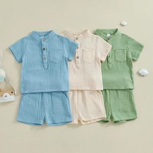 Zestawy odzieży 2024 Baby Summer Cltohes Boys Solid Cotton Short Sleeve Button Pocket T-shirts Krótki szorty dla dzieci