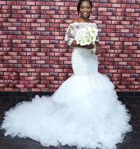 Charmante Südafrika Hochzeitskleider Perlen Spitzenapplikationen 34 Langarmes Plus -Size -Brautkleid flauschige Rüschen abgestufte Meerjungfrau Wedd4933479