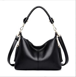 2024 Neue Frauen Tasche mittlere Frauen Tasche koreanischer Stil Quaste Mom Tasche Einfach und modisch eine Schulter-Cross-Body-Tasche Trendy Schwarze Handtasche