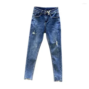 Kvinnors jeans höga midja mager för kvinnor 2024 vår och sommar smala passform hål fläckade fotledslängd blyertsbyxor blå