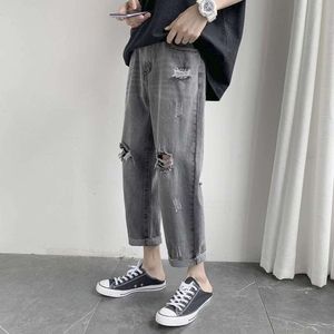 Pantaloni sciolti da uomo, gamba dritta, jeans strappati con buco del mendicante, pantaloni tagliati da uomo, pantaloni da uomo alla moda e versatile gamba larga, stile sottile estivo