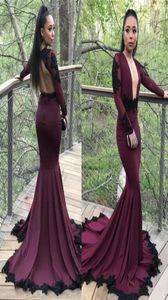 2019 Sexy Burgundy Grape Mermaid Prom Dresses Black Appliqued Long Sleeves Plunging V Neck Black Girls African Party Evening Gowns7929285