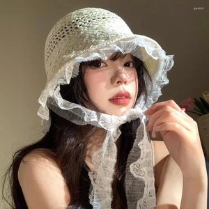 Breite Krempeln Hüte koreanische Spitze Streamer hohl Strohhut Frauen Sommer französische Küste