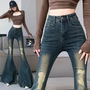 Jeans femininos rasgaram Big Flare for Women 2024 Blue escuro magro magro de borla vintage retalhos de retalhos de bota de jeans calças de moda mujer