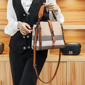 Neue Luxus -Umhängetasche Hong Kong Marke Echter Leder Womens Bag Mode Luxus Wasser Eimer vielseitiger Handheld ein Schulterkreuzkörper