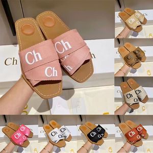 Gratis fraktskor Woody Slides Designer Sandaler Slippare Vita svarta sandaler berömda Designer Women Pink Flat Heels Fashion Woman Sandale Sliders Dhgate