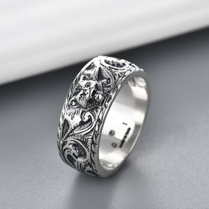 Кольца Женщины мужские кольцевые кольцевые дизайнерские украшения модные украшения титана из нержавеющей стали тигровые кольца повседневная пара классическая ретро-серебро.