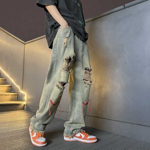 Jeans quebrados masculino de verão fino mendigo de perna reta de pernas insera a marca de moda larga