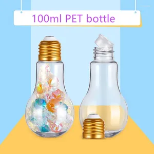 収納ボトル24pcs/lot透明なプラスチック製のペット電球瓶100 ml充填可能な電球フードグレードの蓋付きの蓋付き装飾的な電球