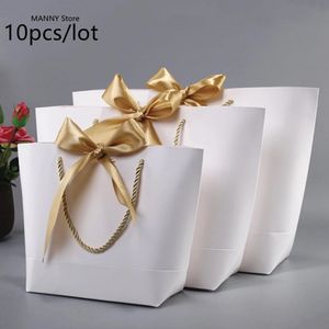 Caixa presente de ouro de tamanho grande para pijamas Clothes Books embalagem Gold Handle Box Bolsa de papel Kraft Paper Gift Bag With Handles Dec 240322